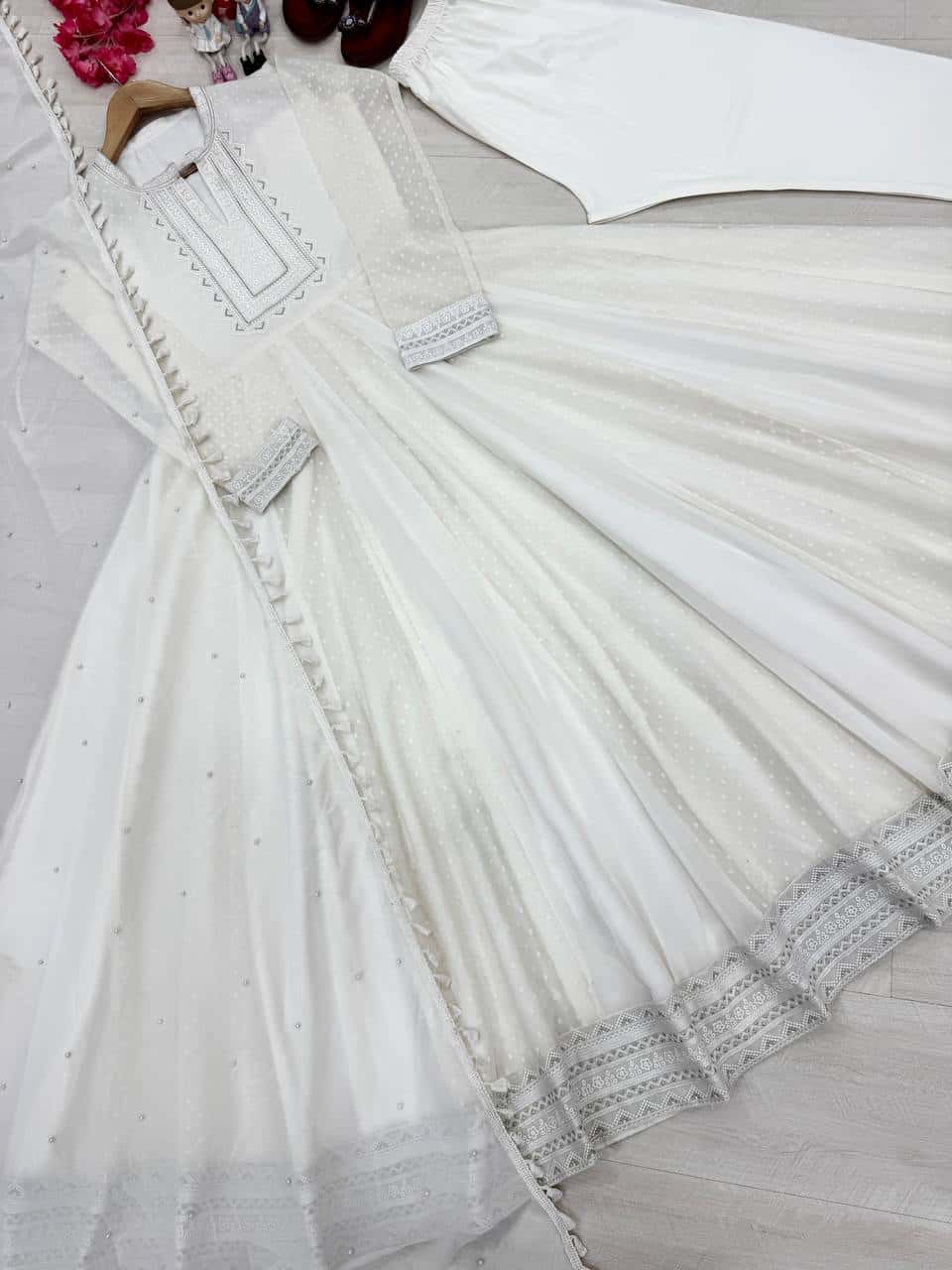"Exquisite Heavy Faux Georgette Anarkali Gown Set with Embroidery, Tassels, and Moti Work"