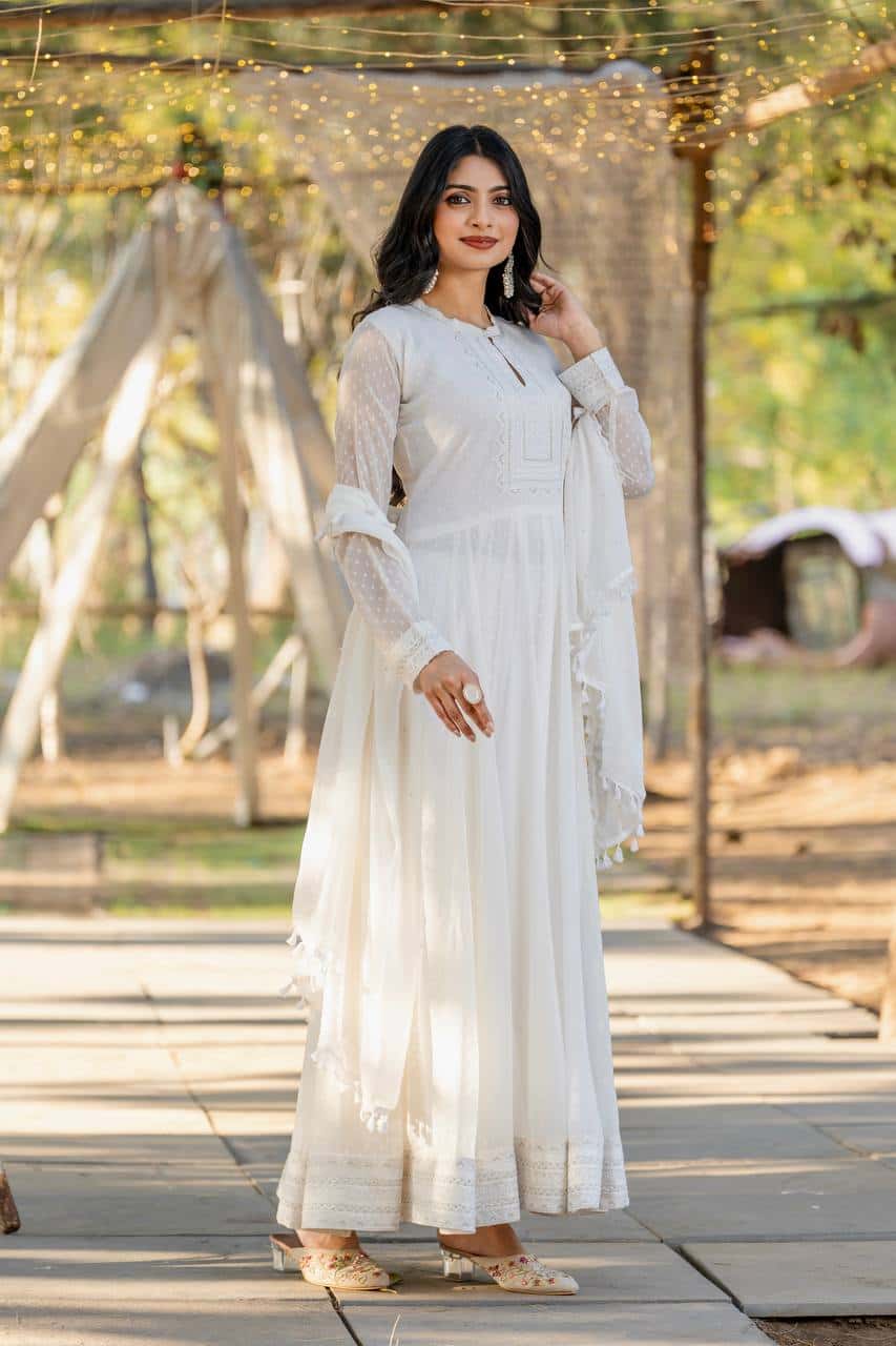 "Exquisite Heavy Faux Georgette Anarkali Gown Set with Embroidery, Tassels, and Moti Work"