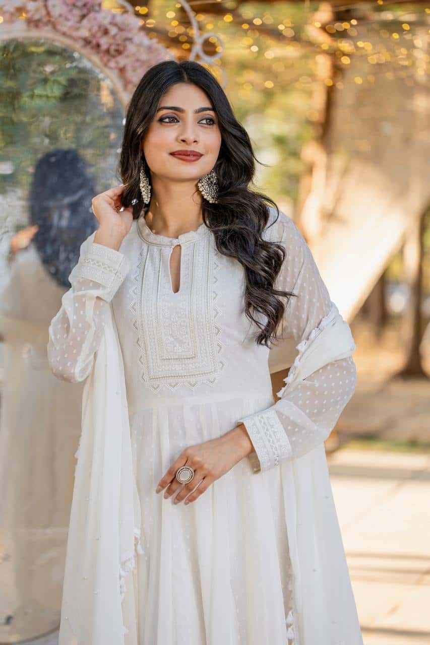 "Exquisite Heavy Faux Georgette Anarkali Gown Set with Embroidery, Tassels, and Moti Work"
