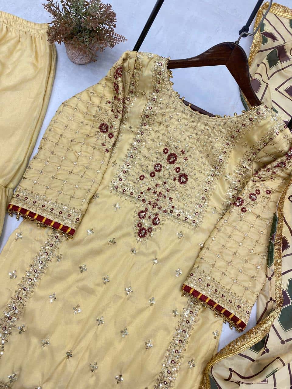 "Embroidered Cosmos Silk Sharara Set with Organza Dupatta and Golden Lace"