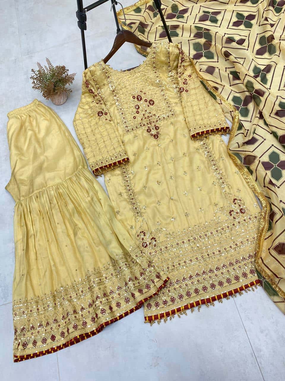 "Embroidered Cosmos Silk Sharara Set with Organza Dupatta and Golden Lace"