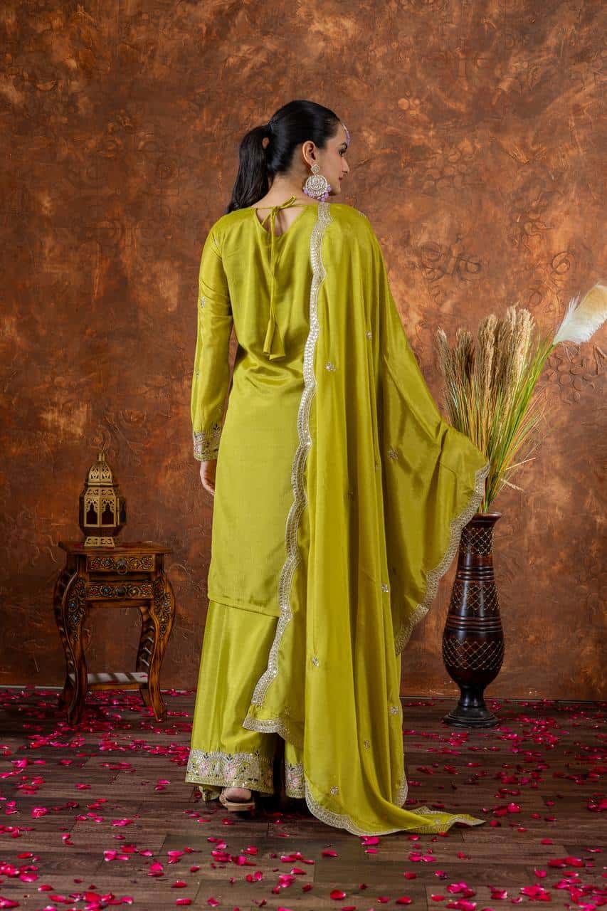 "Festive Embroidered Chinon Silk Ensemble with Tassels and Cutwork Dupatta"