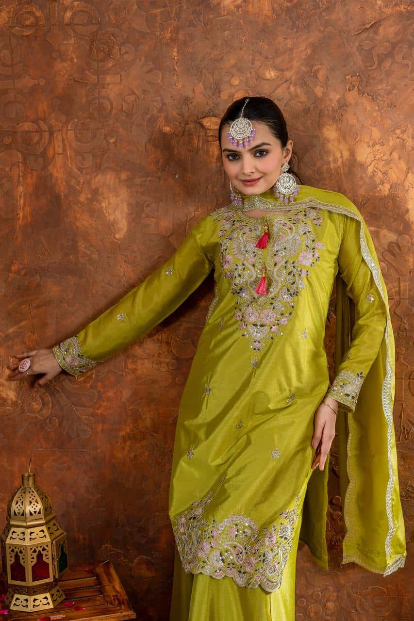 "Festive Embroidered Chinon Silk Ensemble with Tassels and Cutwork Dupatta"