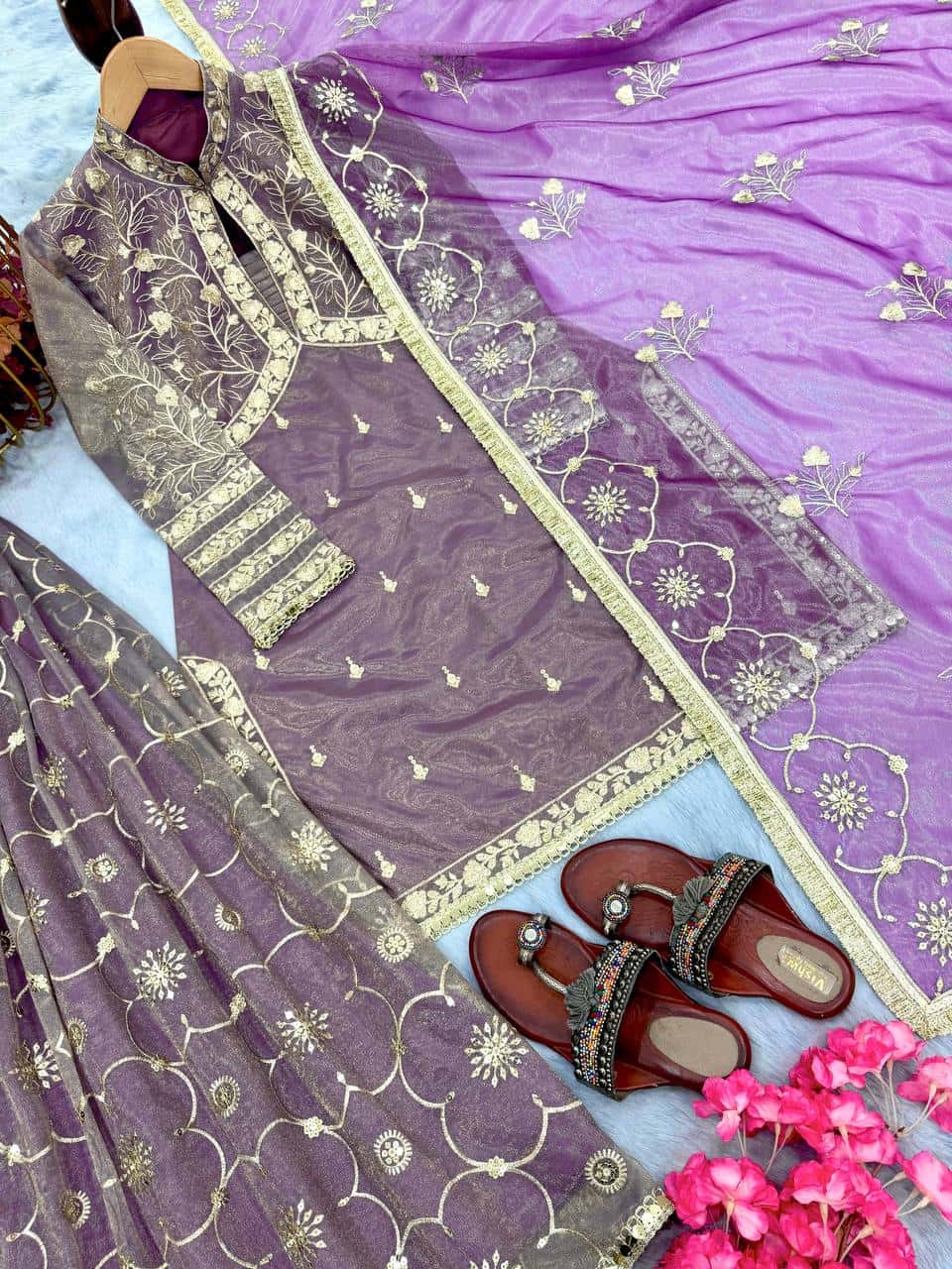 "Luxurious Pur Twil Gold Net Embroidered Suit Set with Sequence Work and Fancy Lace Border"