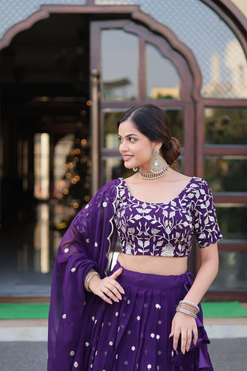 Faux Blooming Georgette with Heavy Sequins Blouse with Lehenga.